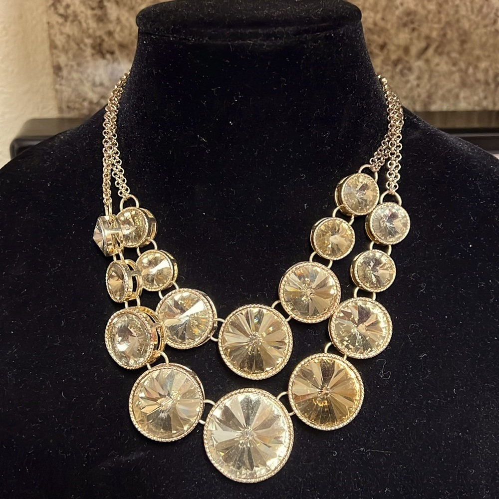 Amber stones in gold setting
